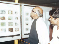 Sri Chandrajeet Yadav (Central Ministre CI ) is watching  the charts in Ganga exhbition