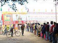 Pilgrims standing outside the exhibition during Mauni Amavsya