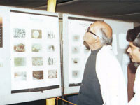 Sri Chandrajeet Yadav (Central Ministre CI ) is watching  the charts in Ganga exhbition